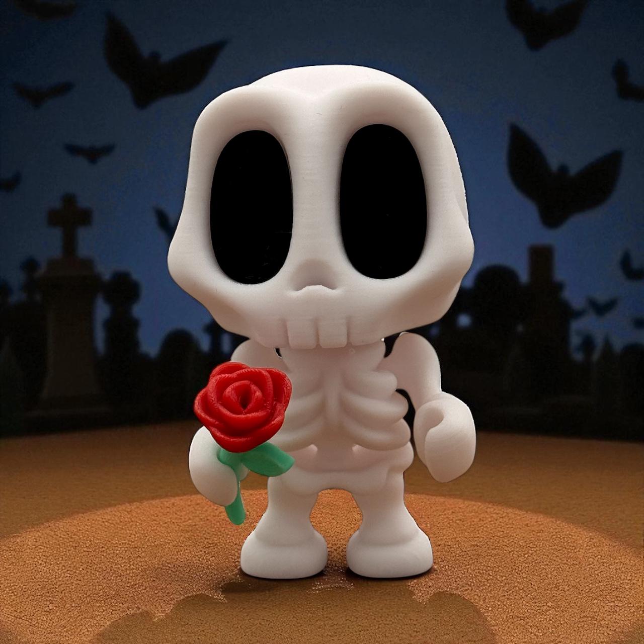 Blob Skeleton Figur als Halloween-Deko, weiße Skelettfigur mit schwarzem Gesicht, hält eine rote Rose in der Hand, 3D-gedruckt vor Friedhofskulisse mit Fledermäusen.