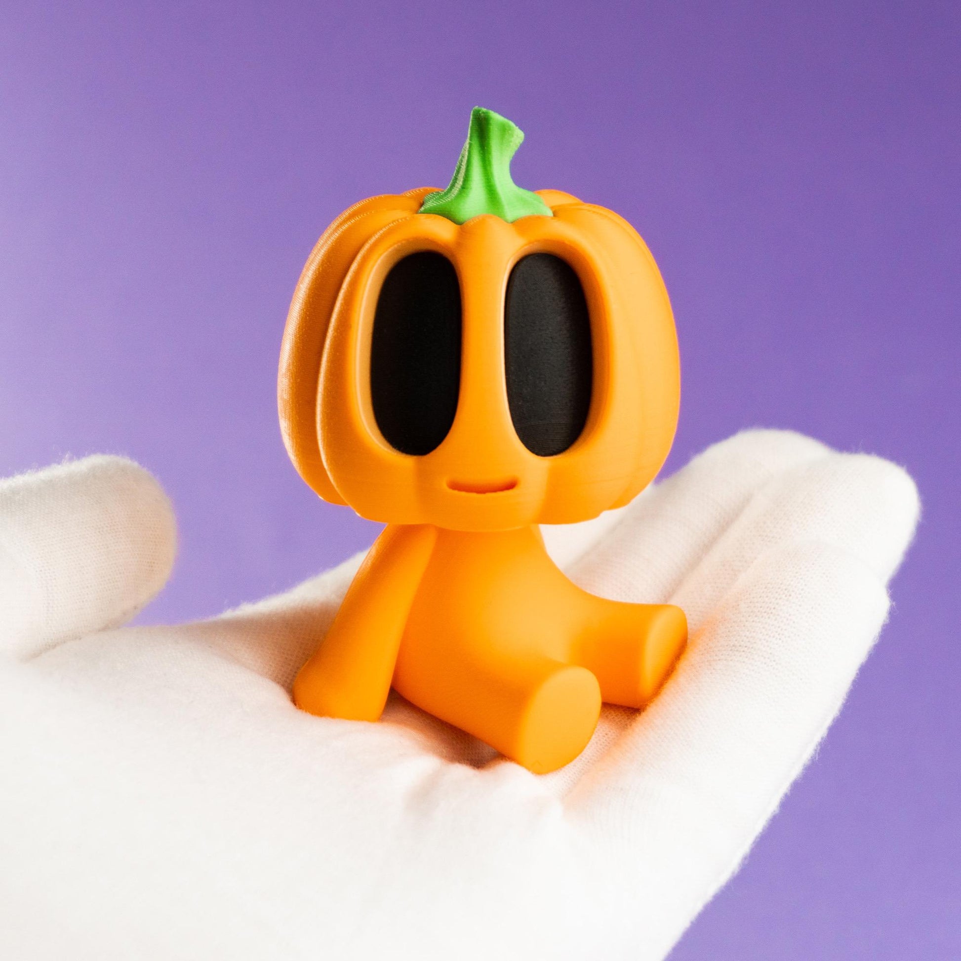 Blob Pumpkin Figur als Halloween-Deko, orangefarbener Kürbis mit schwarzem Augen